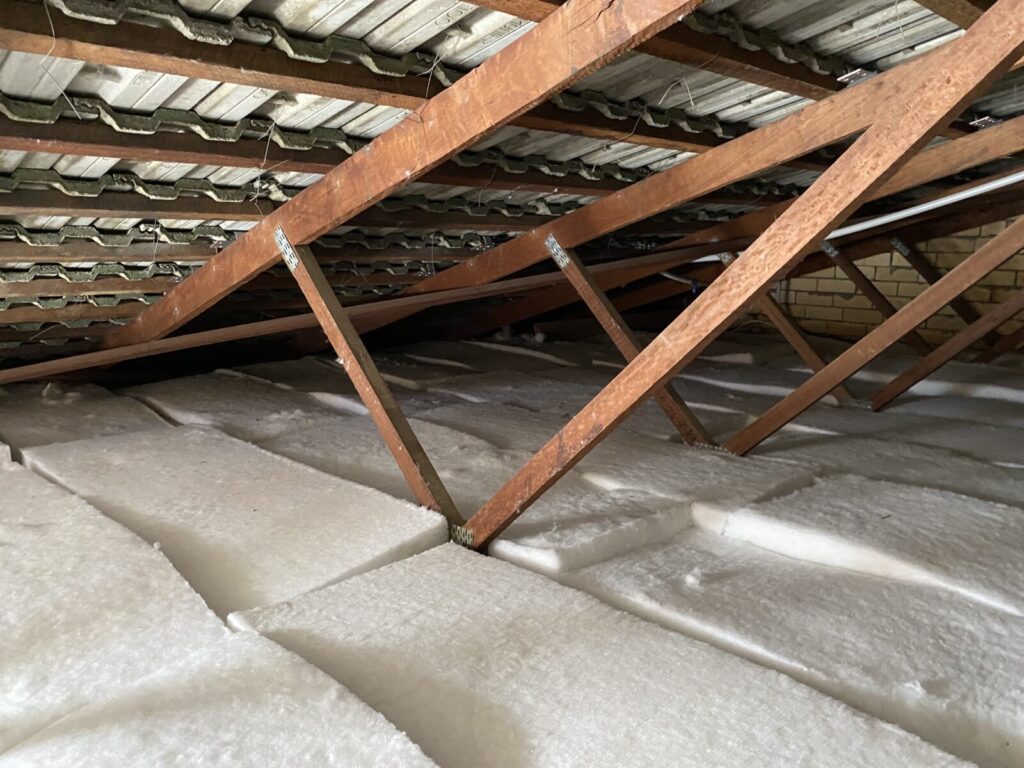 a wooden beams and snow on the ground