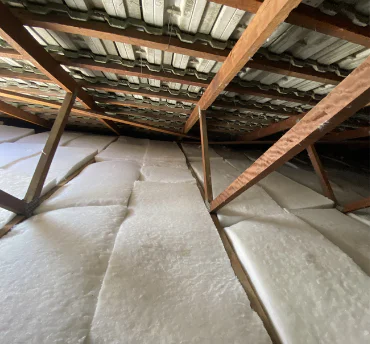 Insulation Installation & Removal Services in Brisbane — exposed roof cavity showing insulation work in progress