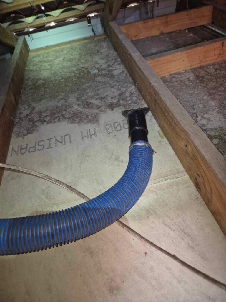 Ceiling insulation fire risk roof cavity with downlights and old insulation batts Brisbane home